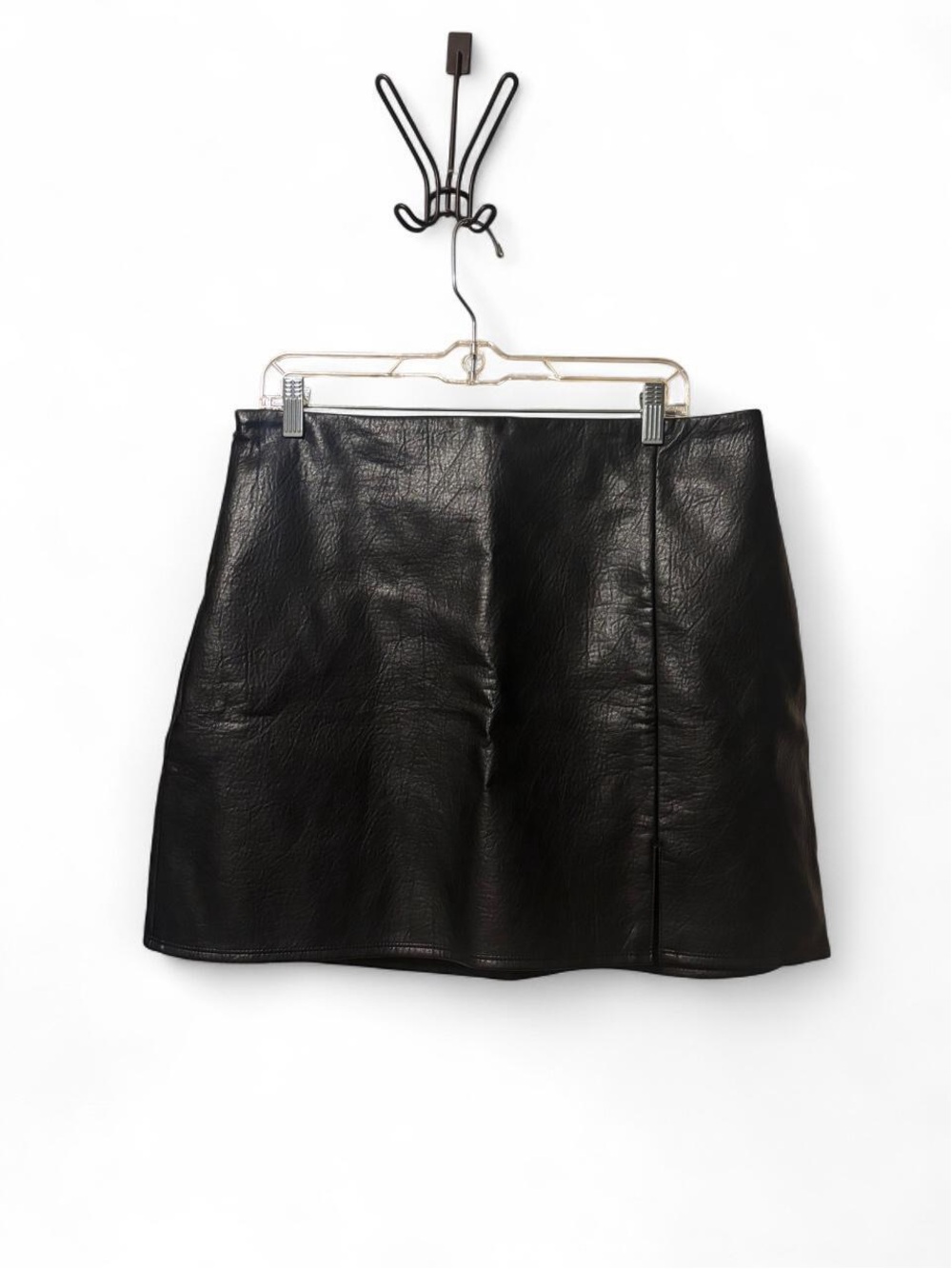 black faux leather mini skirt